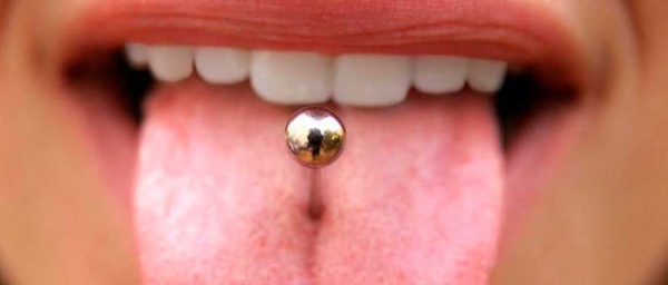 Do tongue piercings harm teeth